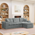 Modern gray boucle sectional sofa with a reversible chaise, plush cushions, and matching throw pillows in a cozy room.