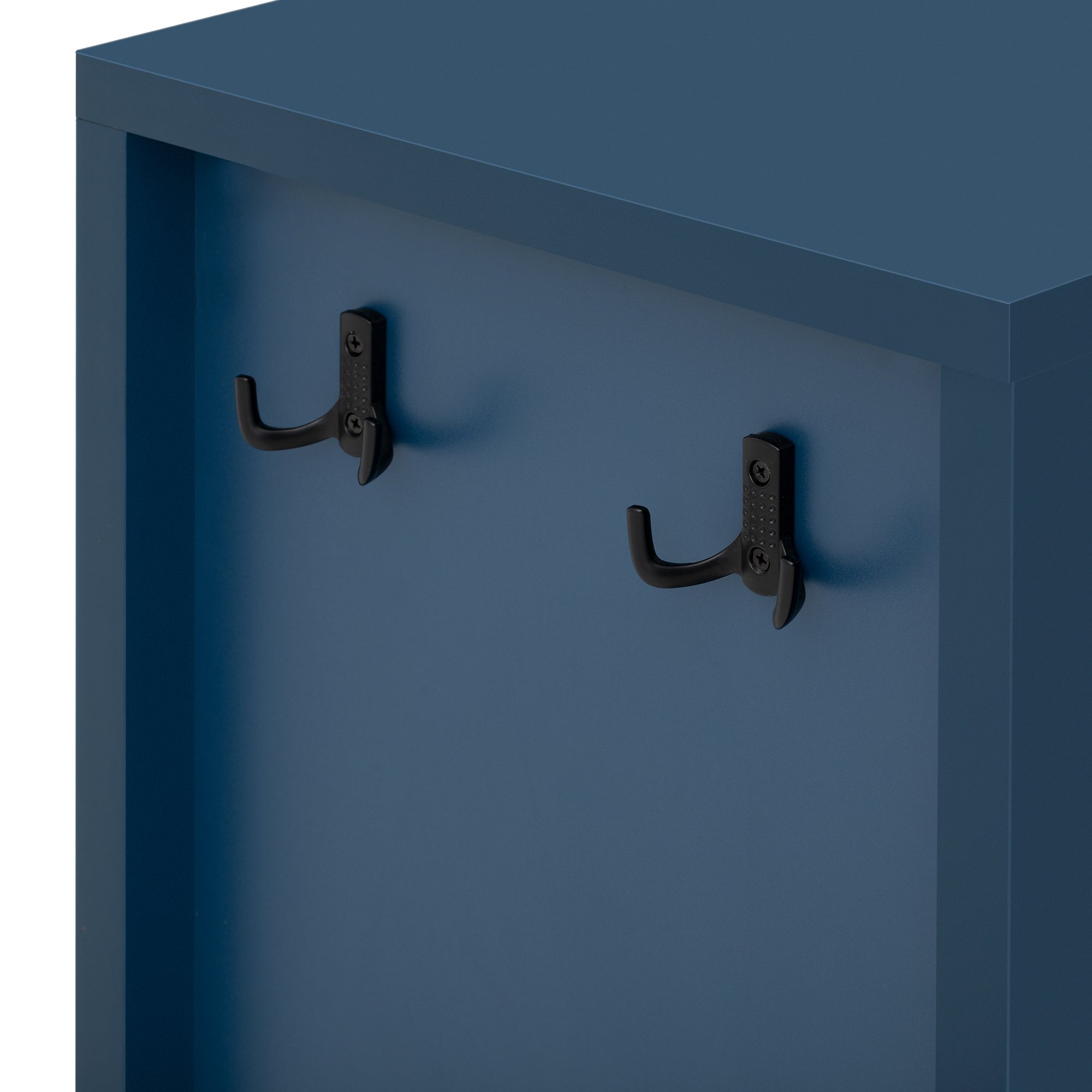 Close-up of black metal hooks on modern navy sideboard side panel. Versatile use for hanging items in entryways or living rooms.