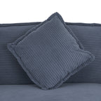 Removable blue corduroy pillow with ribbed texture on the modular sofa. Adds extra comfort and decorative appeal to the seating.