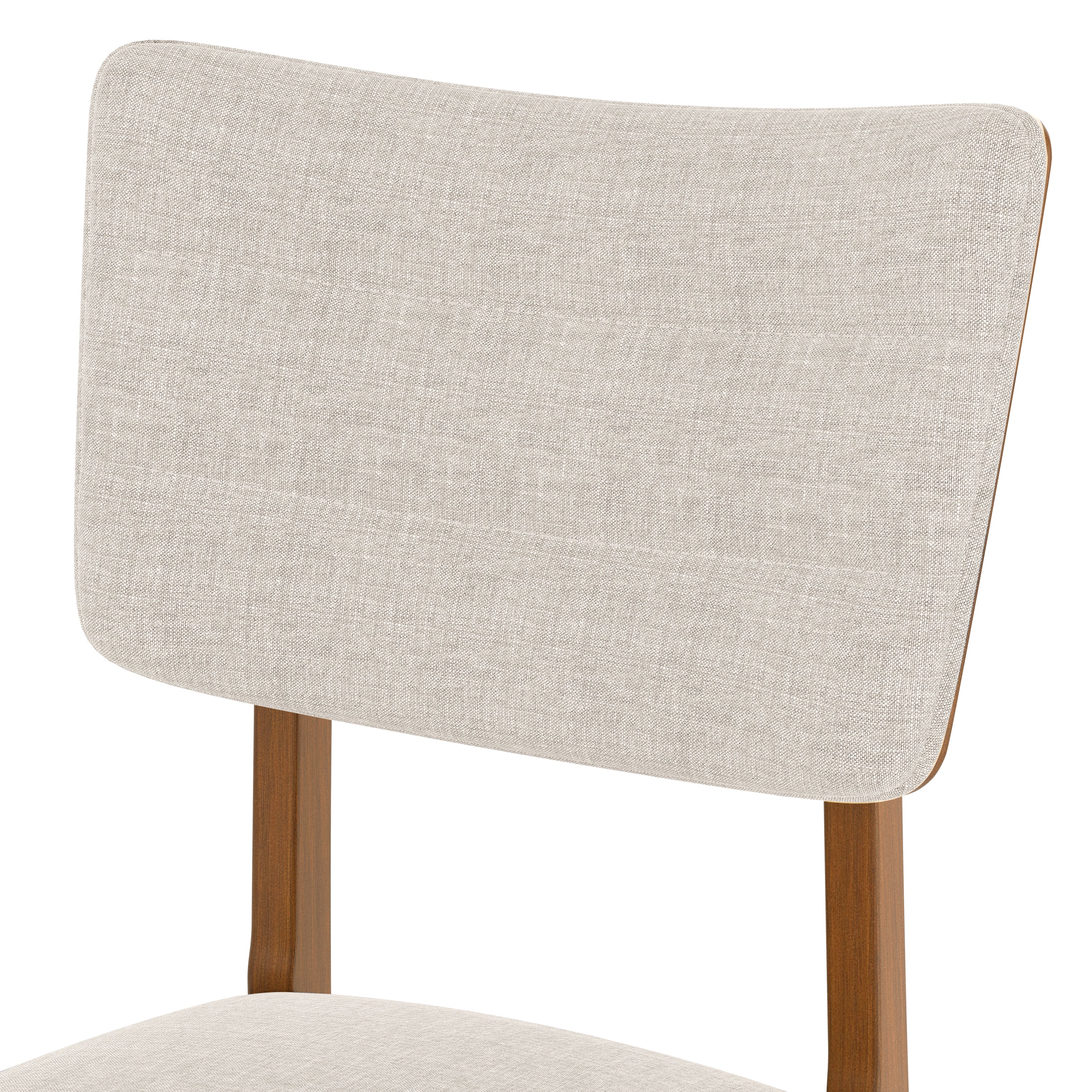 Close-up of the ergonomic backrest with beige upholstery on a Mid-Century Modern Dining Chair.