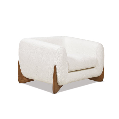 Angled view of Alpine 44' Sherpa Arm Chair showcasing modern design with ivory white boucle and oak legs.