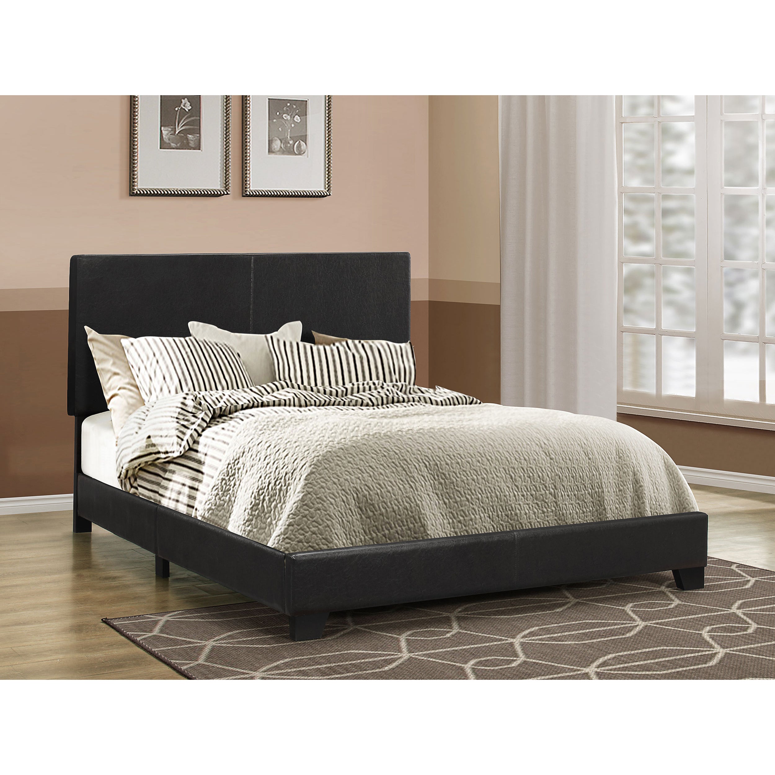 Modern black upholstered queen panel bed with a clean-lined headboard and minimalist low-profile frame.