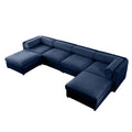 Extra-large blue chenille U-shaped modular sectional sofa with two chaises and cylindrical bolster pillows.