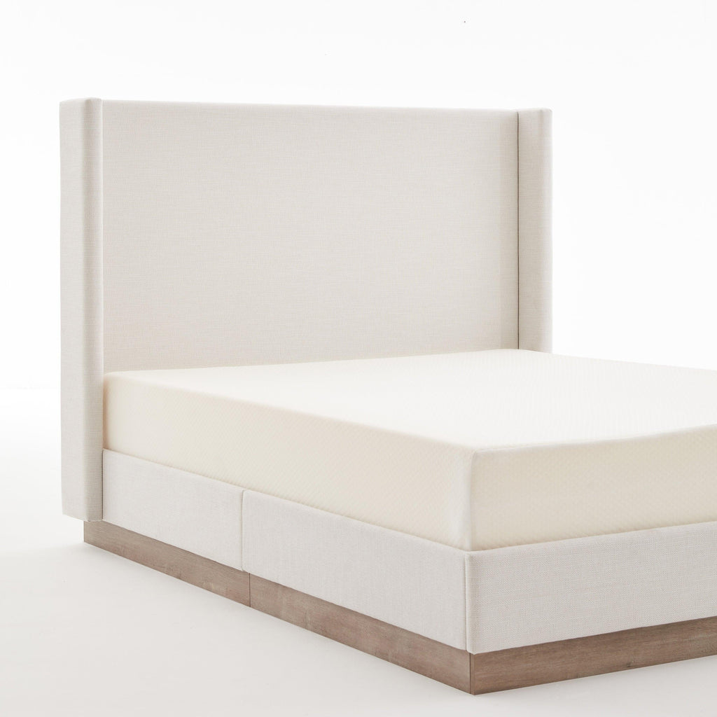 Minimalist Upholstered Wingback Bed with Wood Base Platform.