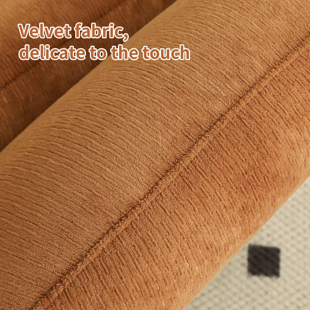 Close-up of velvet fabric on accent chair with solid wood legs, highlighting its soft and delicate texture.