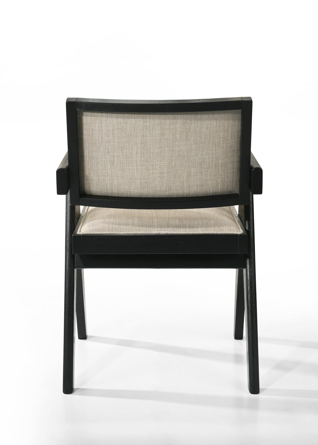 Back view of Jasper dining chair with beige fabric and black wood frame. Clean lines and modern structure.