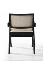 Back view of Jasper dining chair with beige fabric and black wood frame. Clean lines and modern structure.
