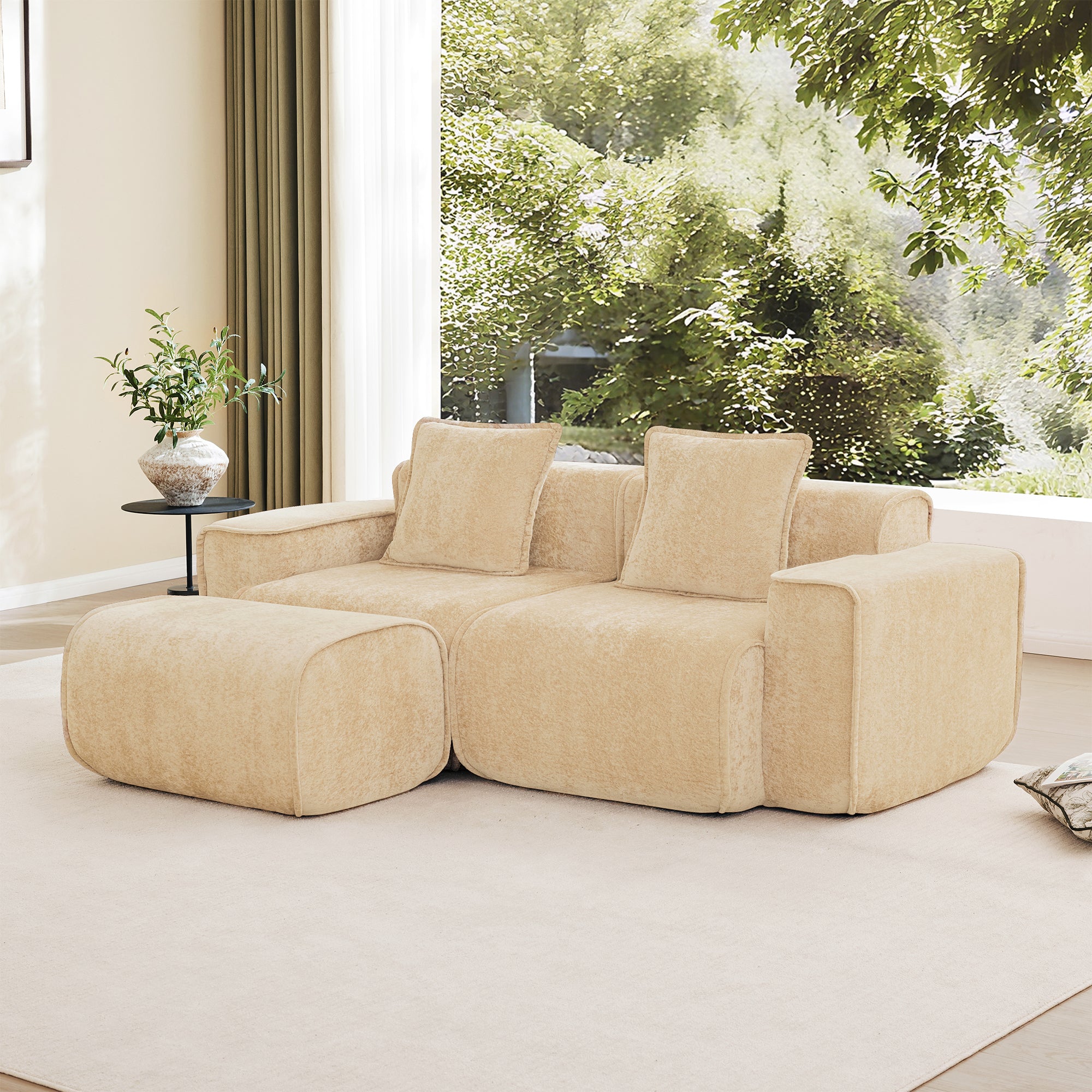 Beige Velvet L Shape Modular Sofa with Ottoman and throw pillows, arranged in an L configuration for versatile seating in a bright living space.
