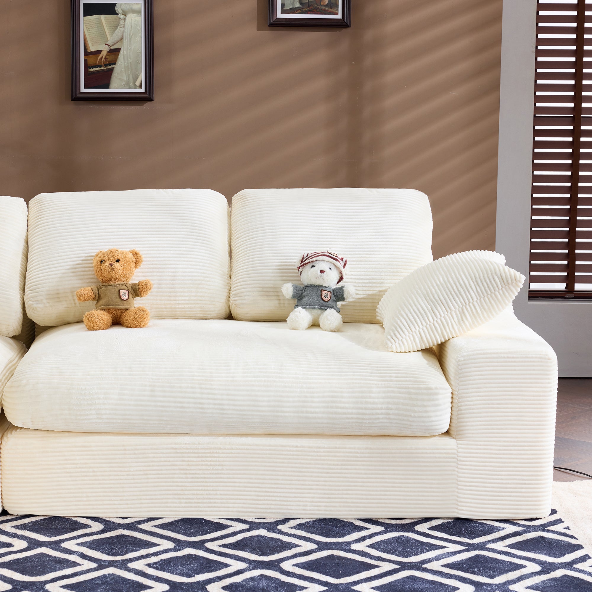 Close-up of right seating area of White Corduroy Sofa with plush cushions and soft corduroy fabric for cozy lounging.