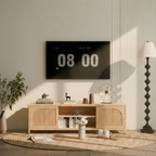 Natural bamboo media console featuring arched, reeded cabinet doors and open center shelving in a bright, modern room.