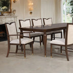 Dining room setup with transitional dining arm chairs and matching table, showcasing cohesive style and luxurious design.