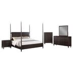 Modern transitional bedroom set in dark brown wood with silver-toned hardware, featuring a poster bed, dresser, mirror.