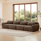 Angled view of modular chocolate plush sofa with deep seating and ergonomic backrests, ideal for modern living room comfort and style.