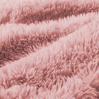 Detailed view of fluffy pink plush fabric used in modular sofa, emphasizing softness and comfort in ergonomic furniture design.