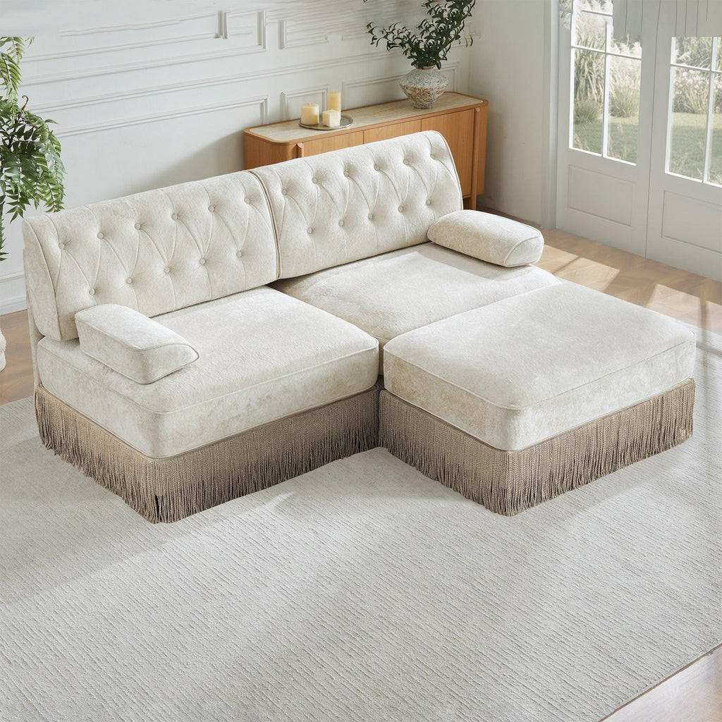 Modular Chesterfield Style Sofa with Tassel Skirt.