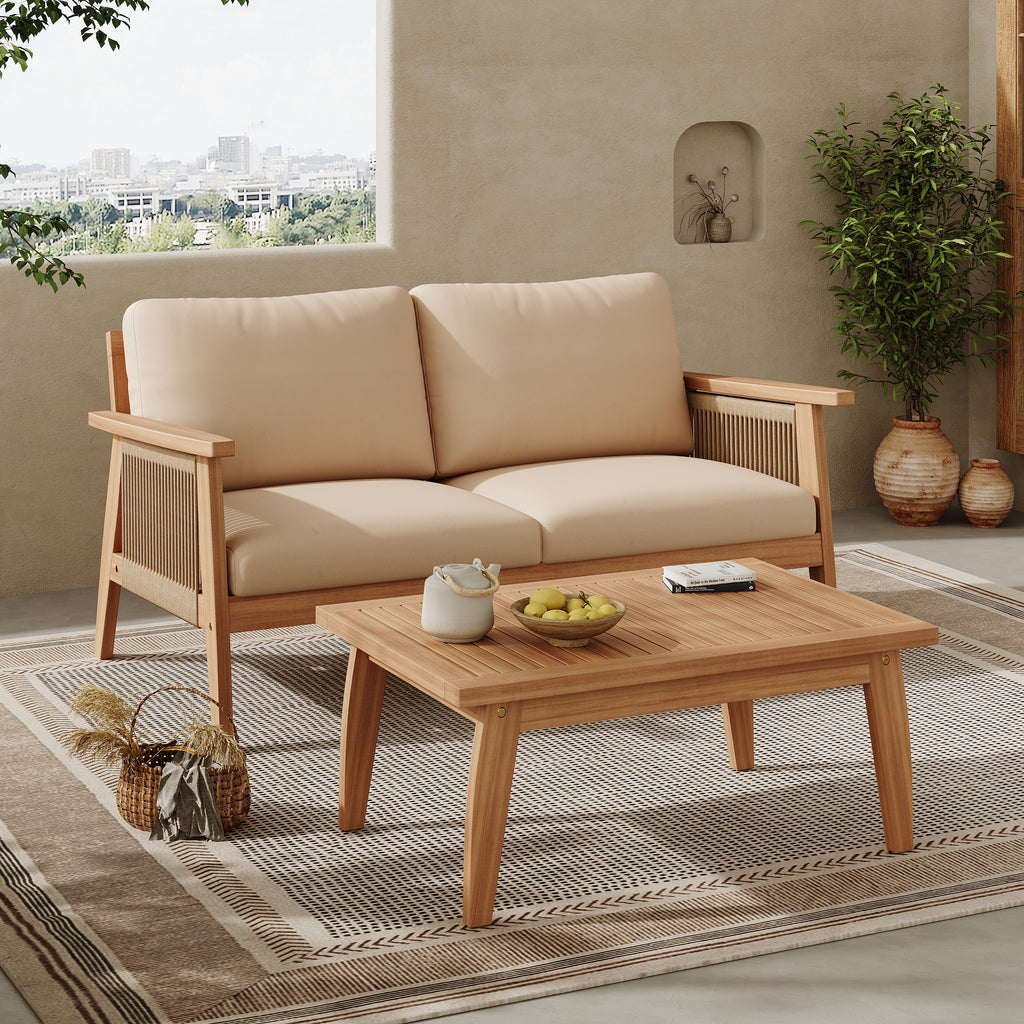 Two-piece acacia wood chat set featuring a loveseat with rope-accented sides, cream cushions, and a slatted coffee table.