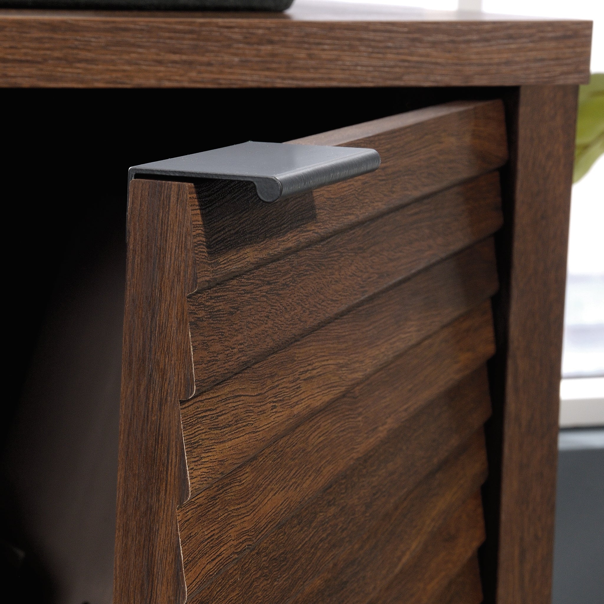 Side view of the Library Base, Brown finish cabinet door with handle, showing durable engineered wood construction.