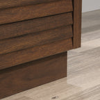 Base detail of the Library Base, Brown finish cabinet resting on wood flooring, emphasizing its sturdy freestanding design.