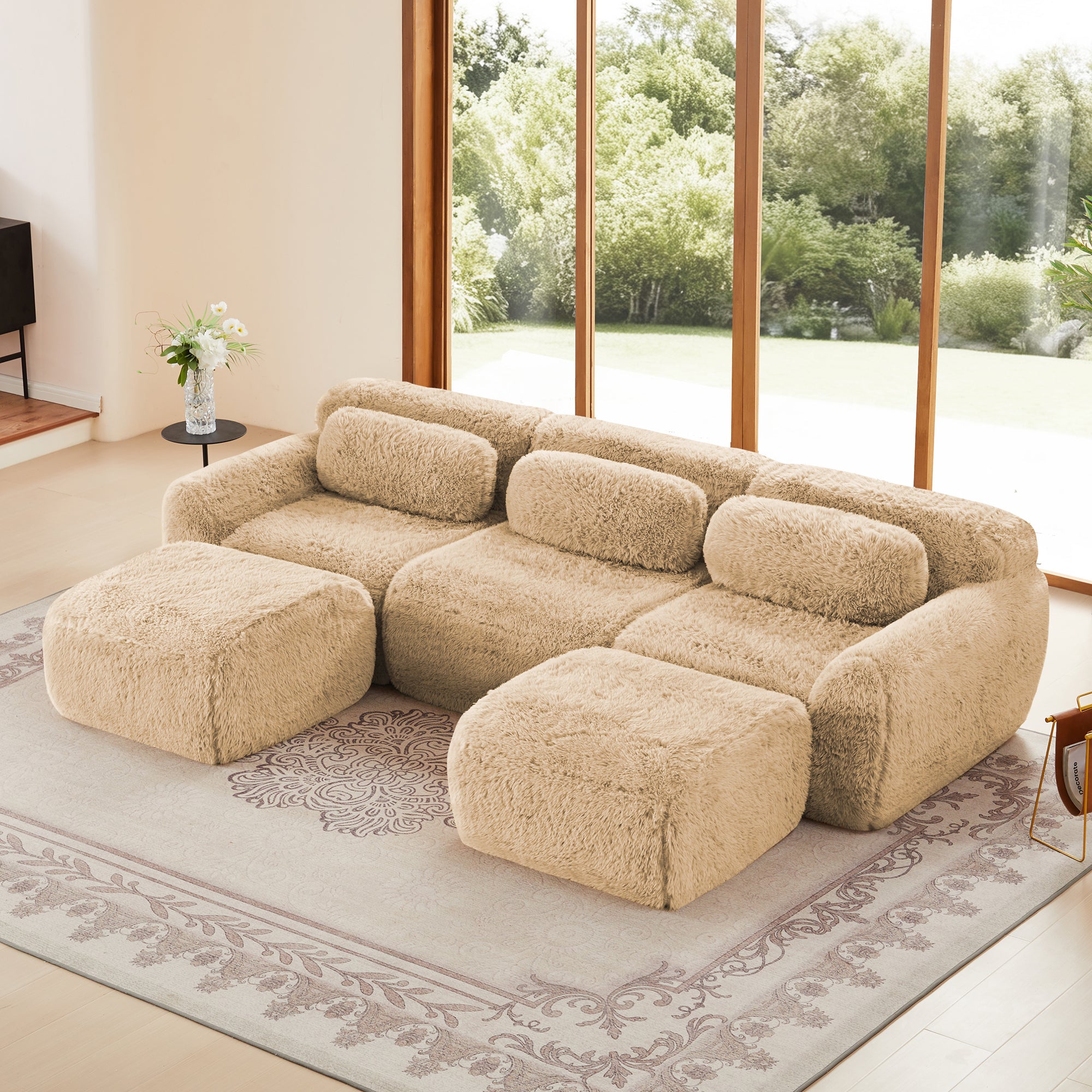 Modular U-Shaped Sofa in plush beige fabric with anti-slip base, featuring chaise and ergonomic cushions in a sunlit living room.