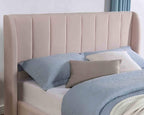 Light Pink Queen Bed with Wingback Headboard.