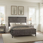 Storehouse queen panel bed in smoked grey wood with a rustic farmhouse style, featuring vertical planks and metal accents.