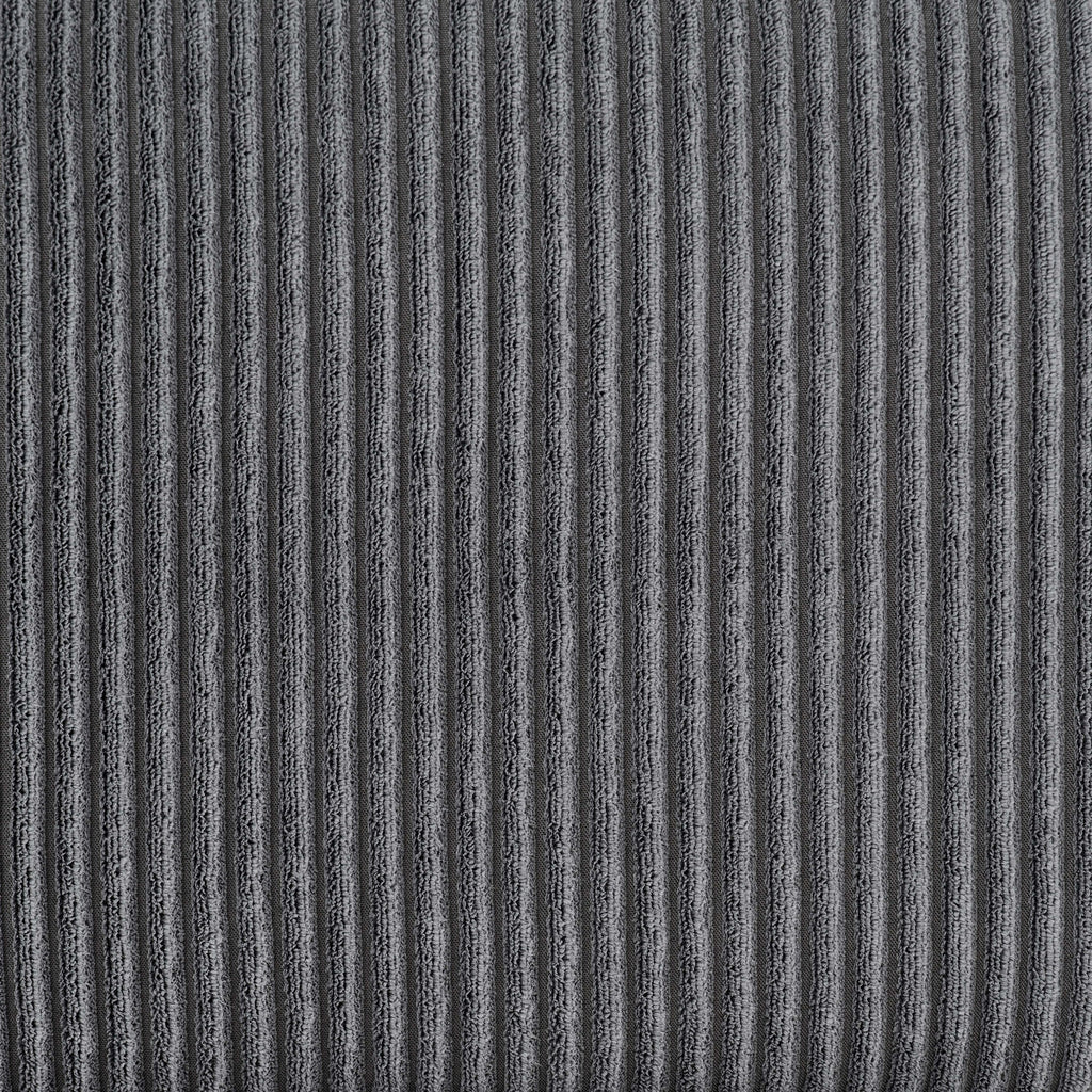 Close-up of dark gray corduroy fabric texture used on the modular sectional. Features soft ribbed pattern for added comfort.