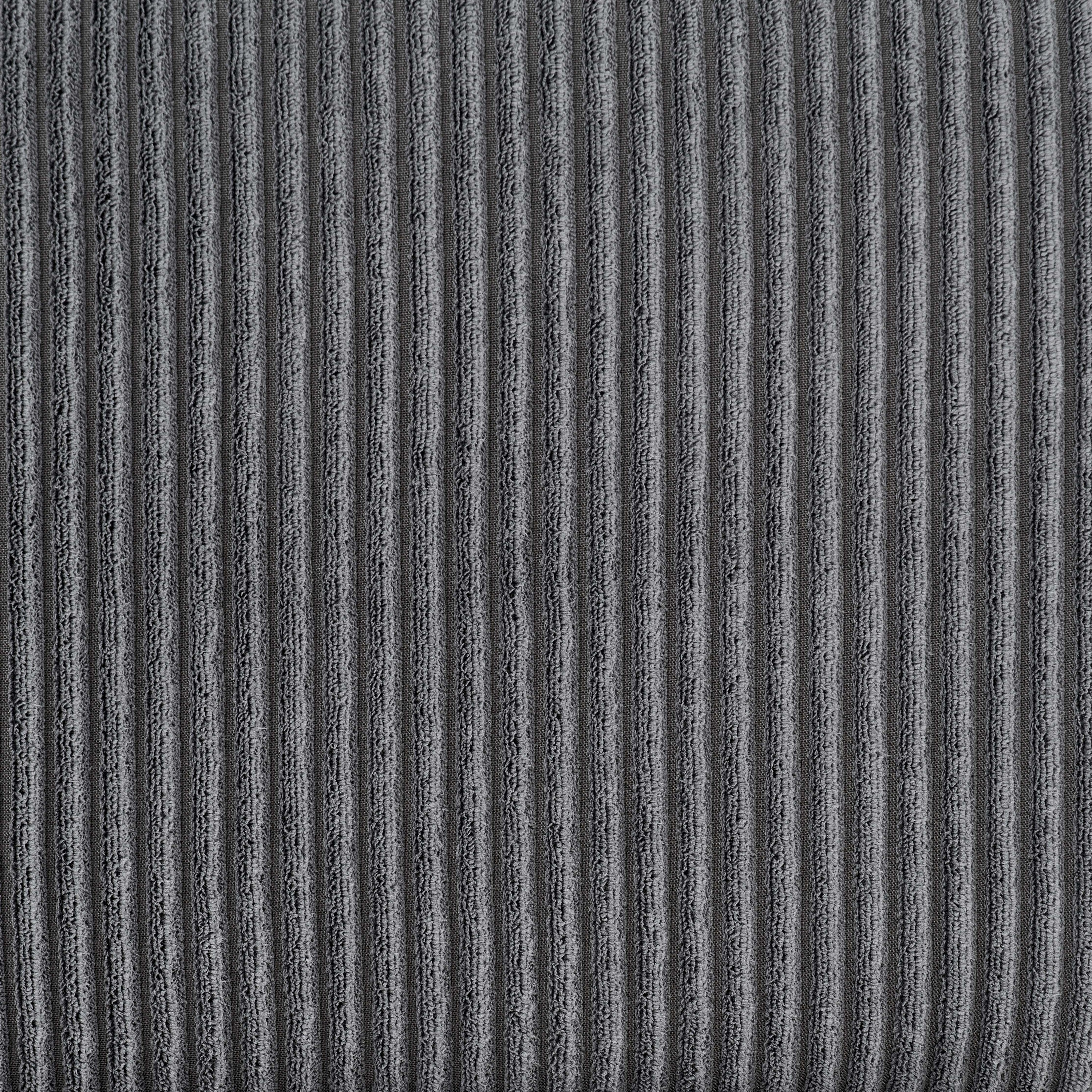 Close-up of dark gray corduroy fabric texture used on the modular sectional. Features soft ribbed pattern for added comfort.