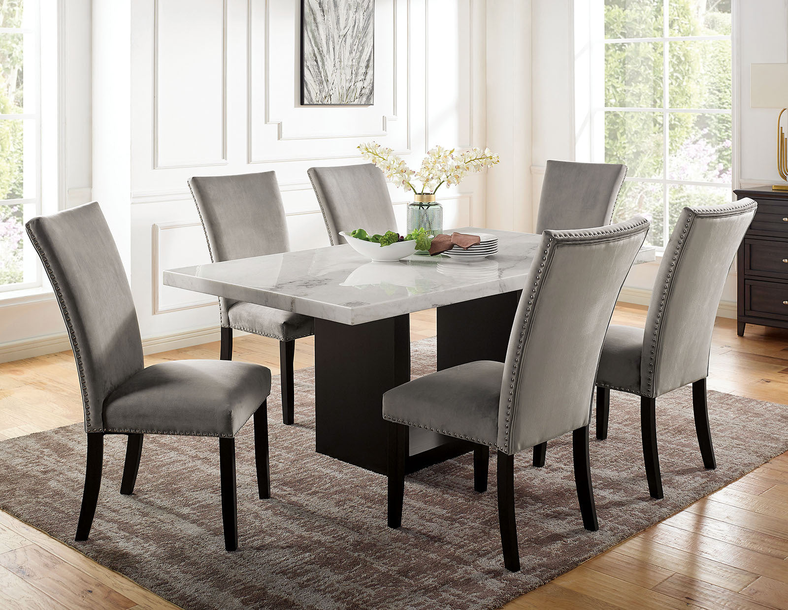 Marble dining table set - 7pc with genuine marble top and 6 grey upholstered chairs in a modern dining room. Ideal for elegant dining spaces.