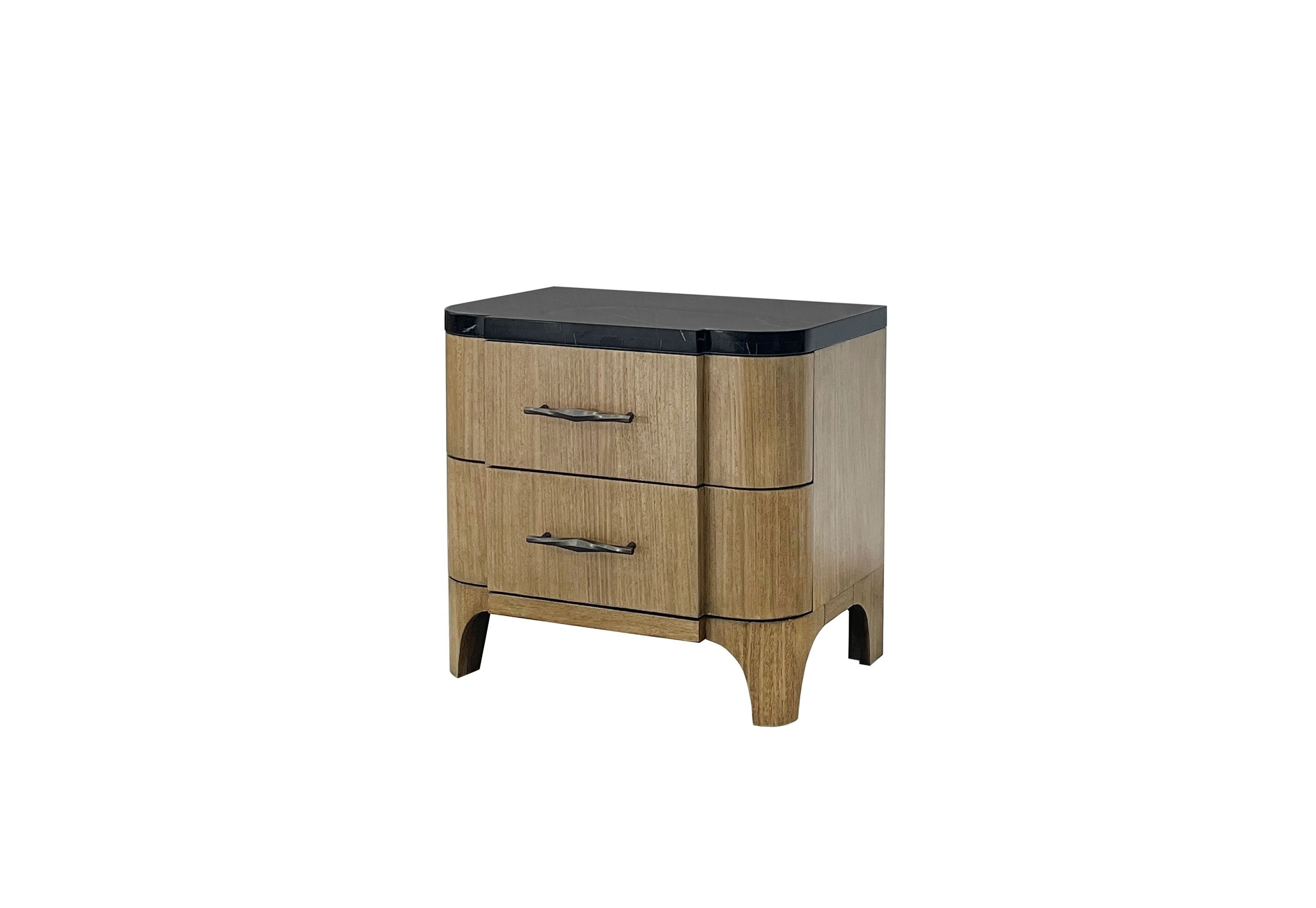 Angled view of 2 Drawer Stone Top Nightstand with USB Charging, showcasing curved edges and sleek metal handles for stylish bedside storage.