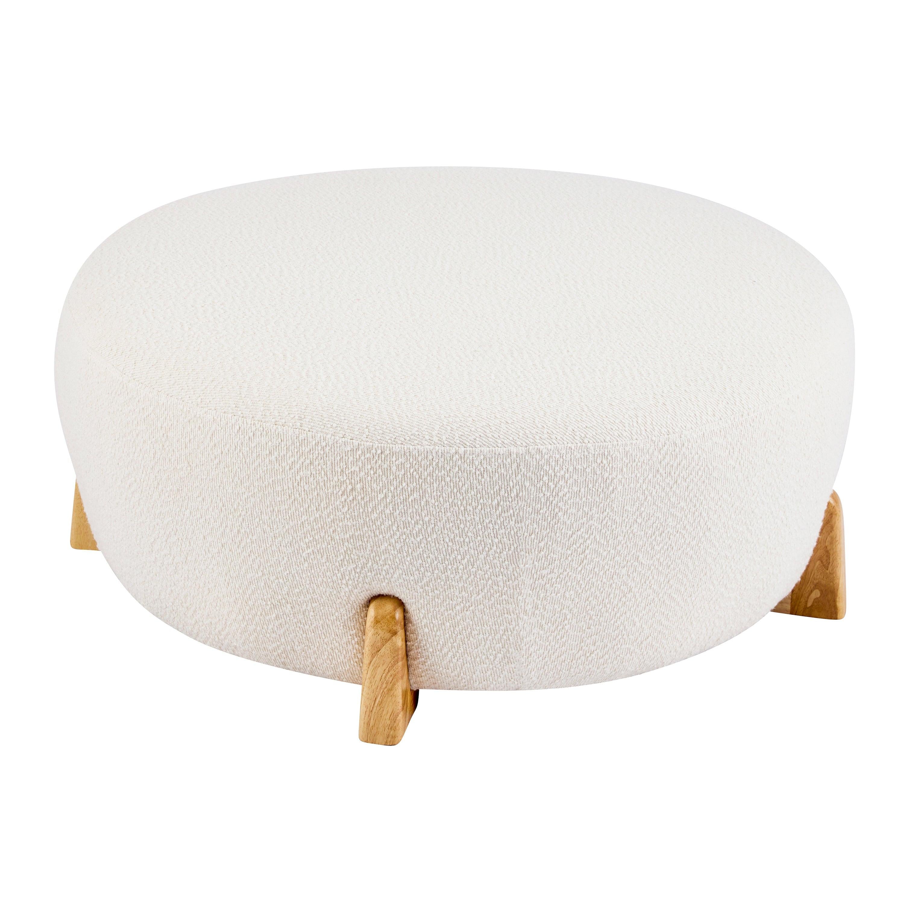 Modish Round Ottoman with Boucle Top and Natural Wood Legs.