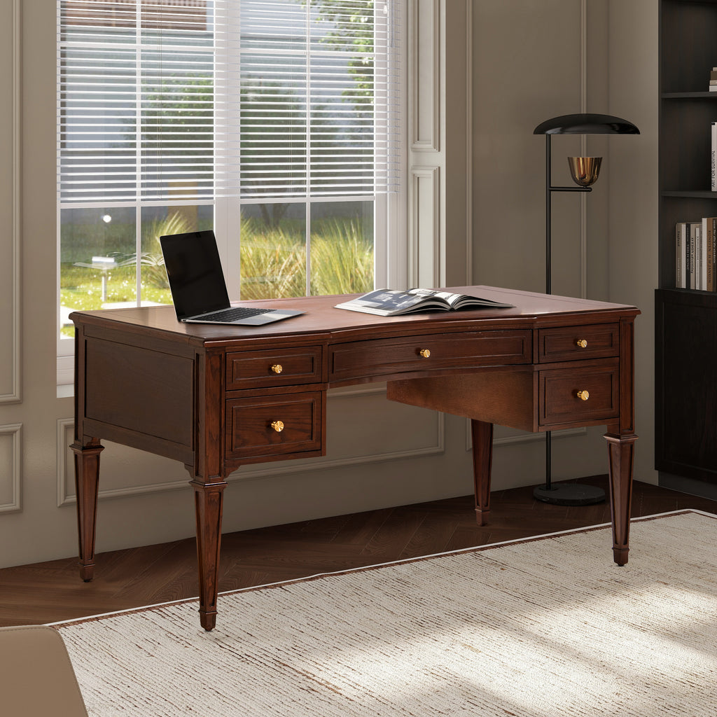 Executive Desk 5-Drawer Wood - Gold Accents placed near window with laptop. Features spacious top and classic tapered legs.
