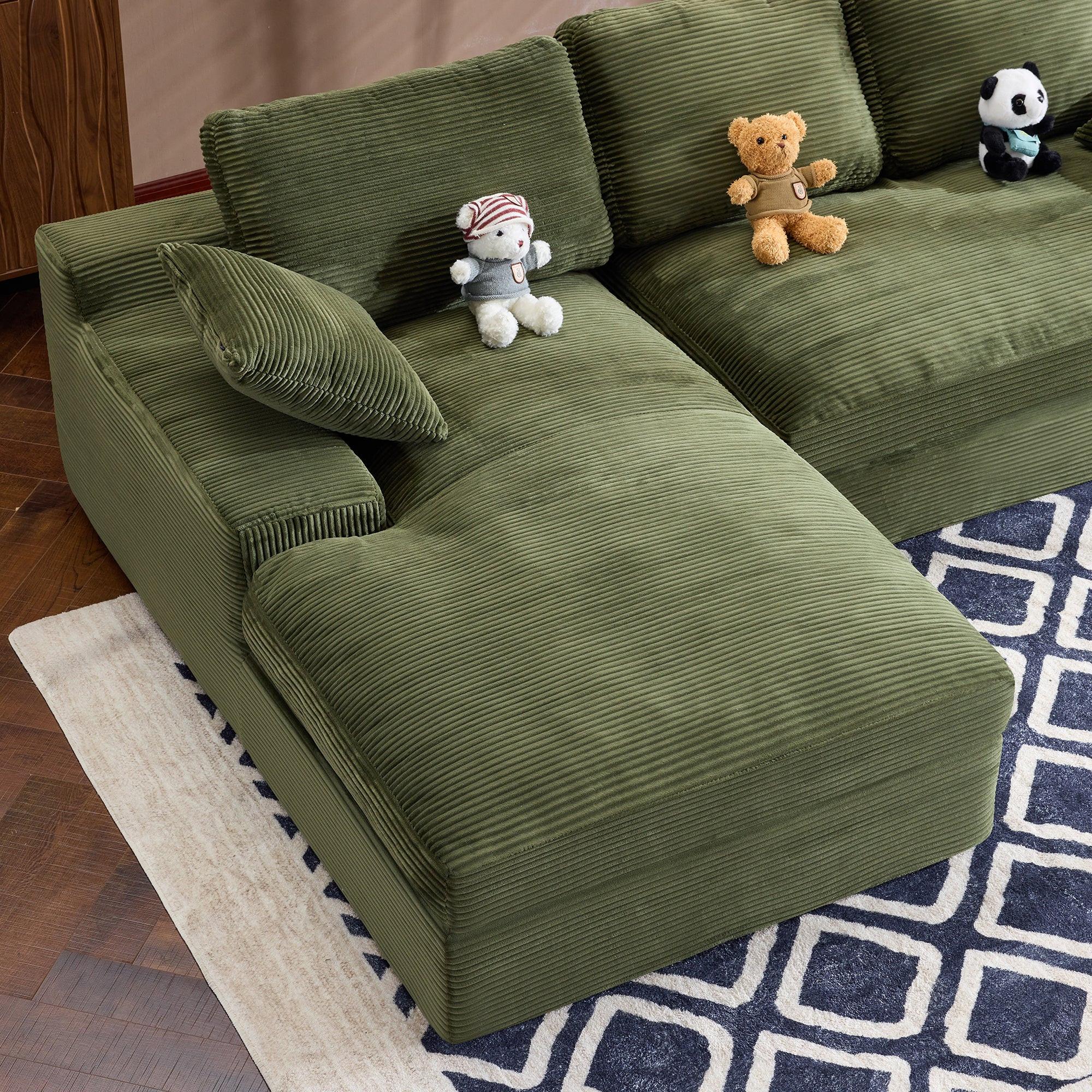 Green Corduroy Sofa with Cushions and Pillows.