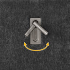 Close-up of adjustable lamp mechanism on queen upholstered bed. Built-in lighting complements solid frame and pleated headboard.