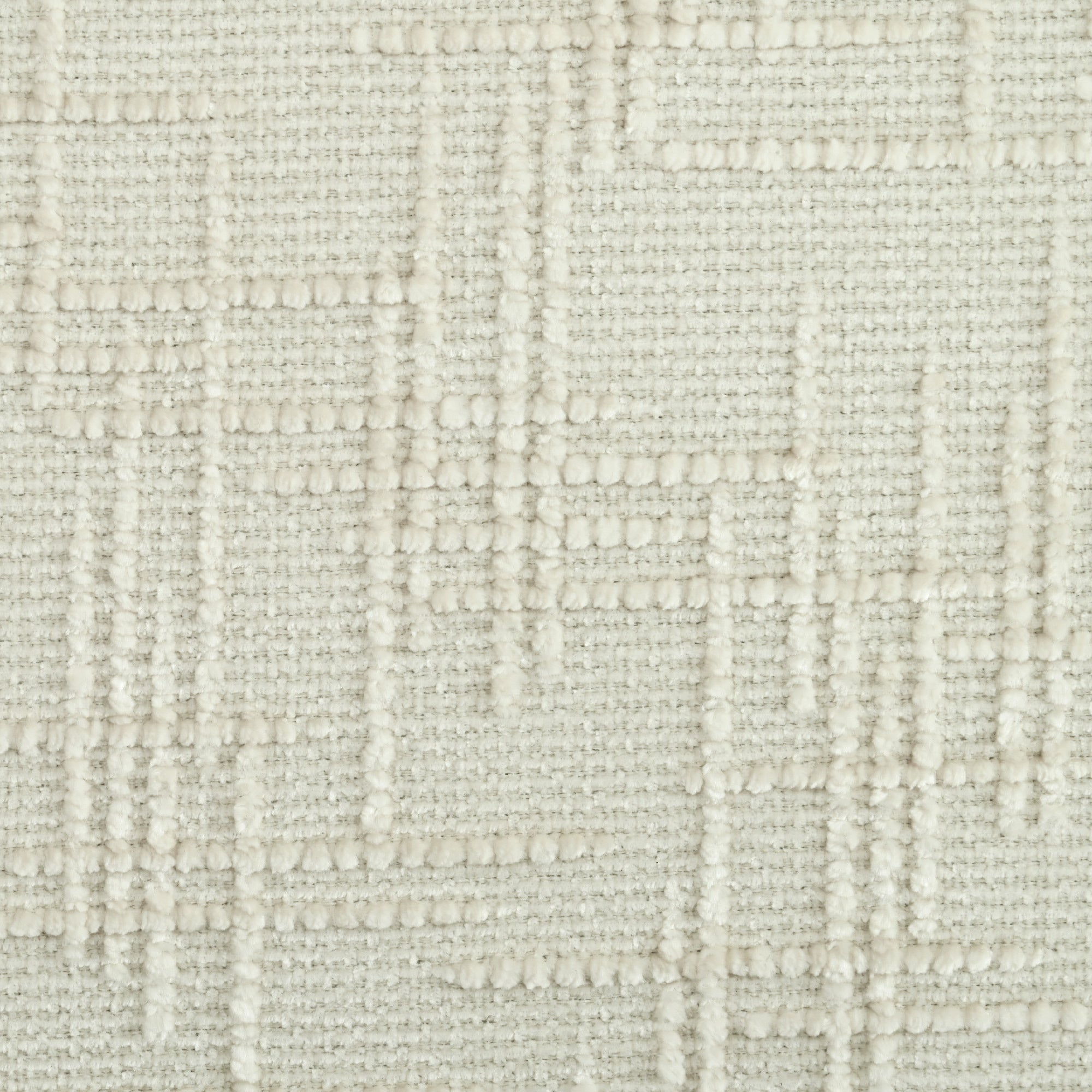 Close-up of chenille upholstery pattern on the U-shaped sectional sofa with ottoman, showing intricate woven texture.