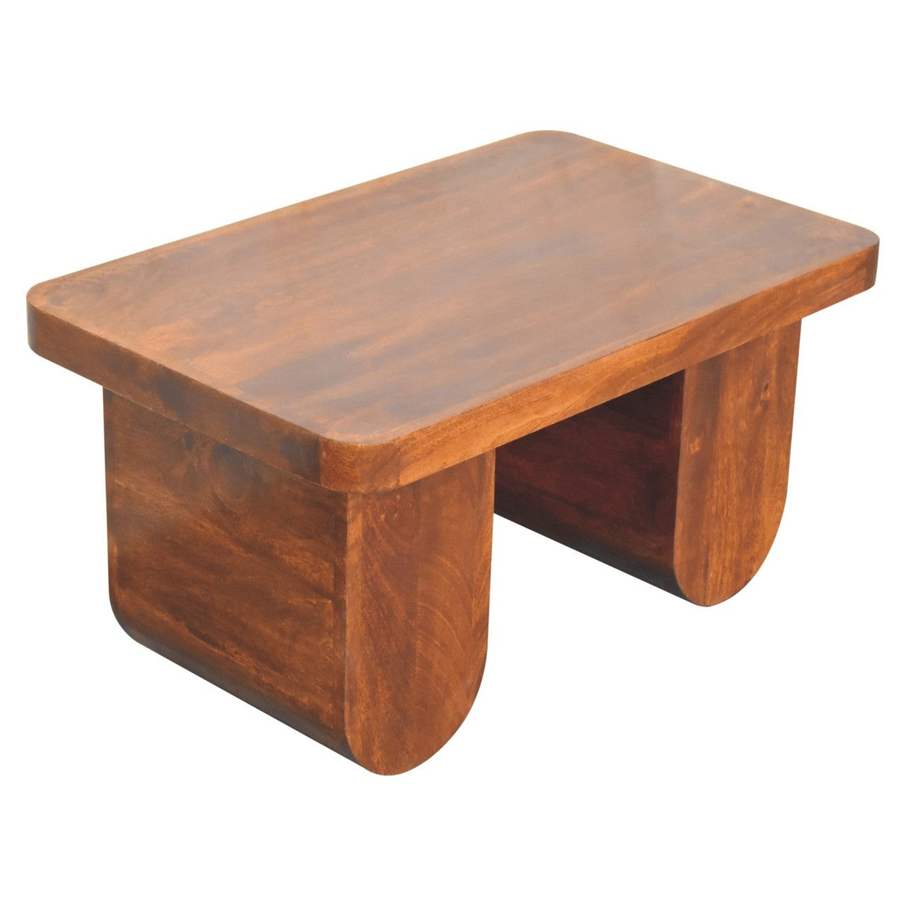 Top angled view of solid mango wood coffee table with thick rectangular surface and rounded legs in chestnut tone.