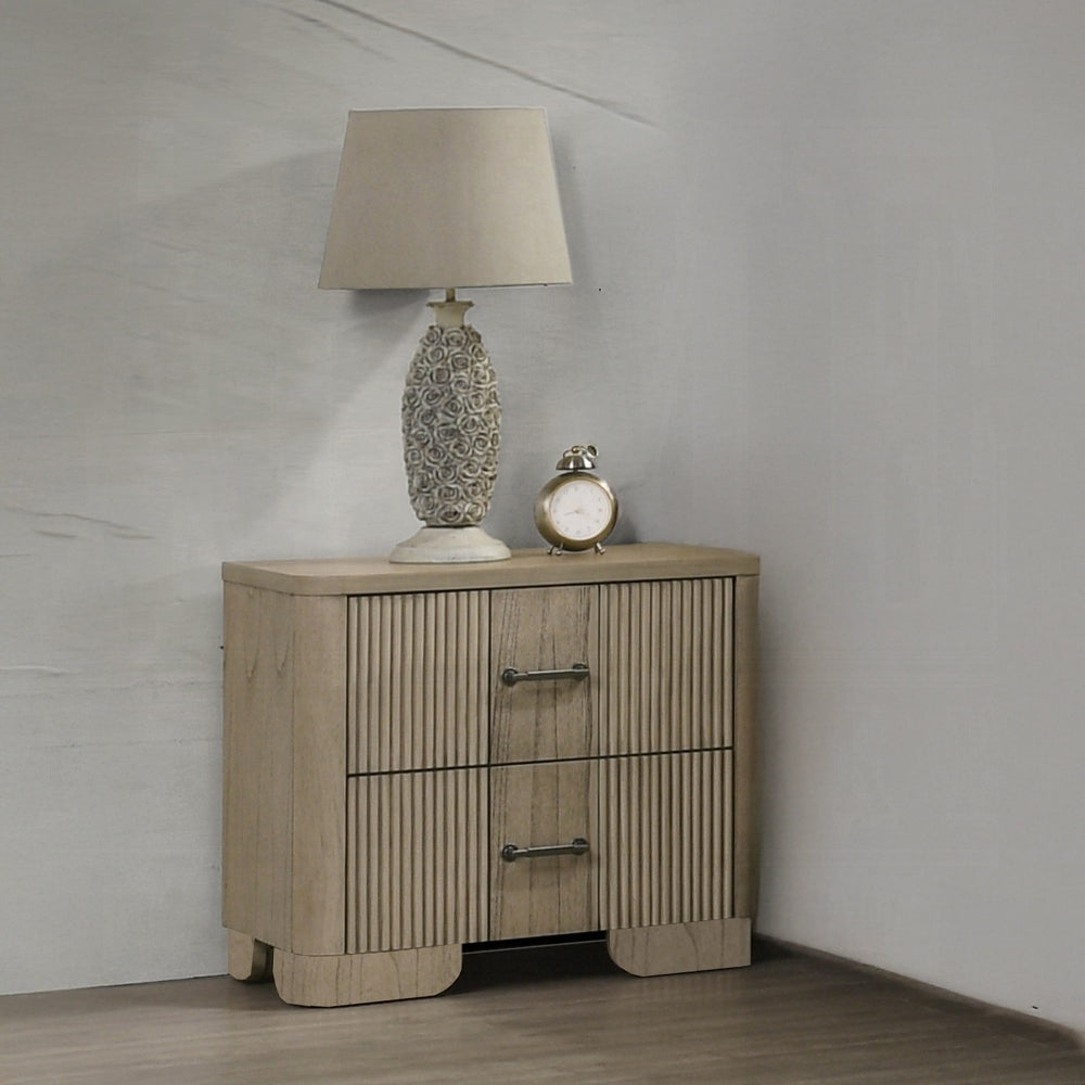 Transitional nightstand with 2 drawers in antique oak placed in a bedroom corner, styled with a lamp and clock. Rustic oak finish adds charm.