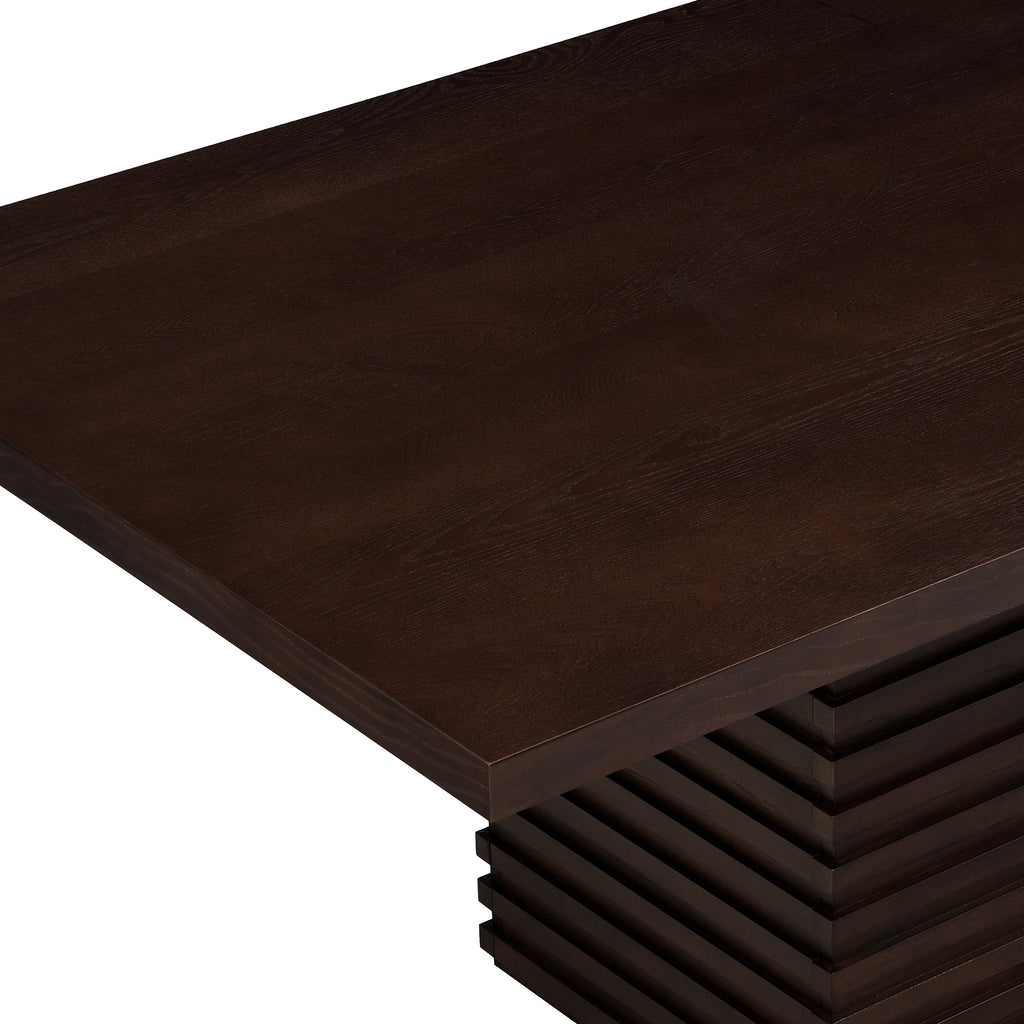Close-up of the espresso dining table's corner, highlighting the rich wood grain texture and solid craftsmanship of the tabletop.