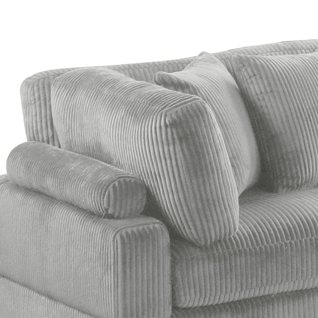 Close-up of Bentley Modular Sectional Sofa in gray corduroy fabric, showcasing plush cushions and modern ribbed texture.