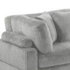 Close-up of Bentley Modular Sectional Sofa in gray corduroy fabric, showcasing plush cushions and modern ribbed texture.