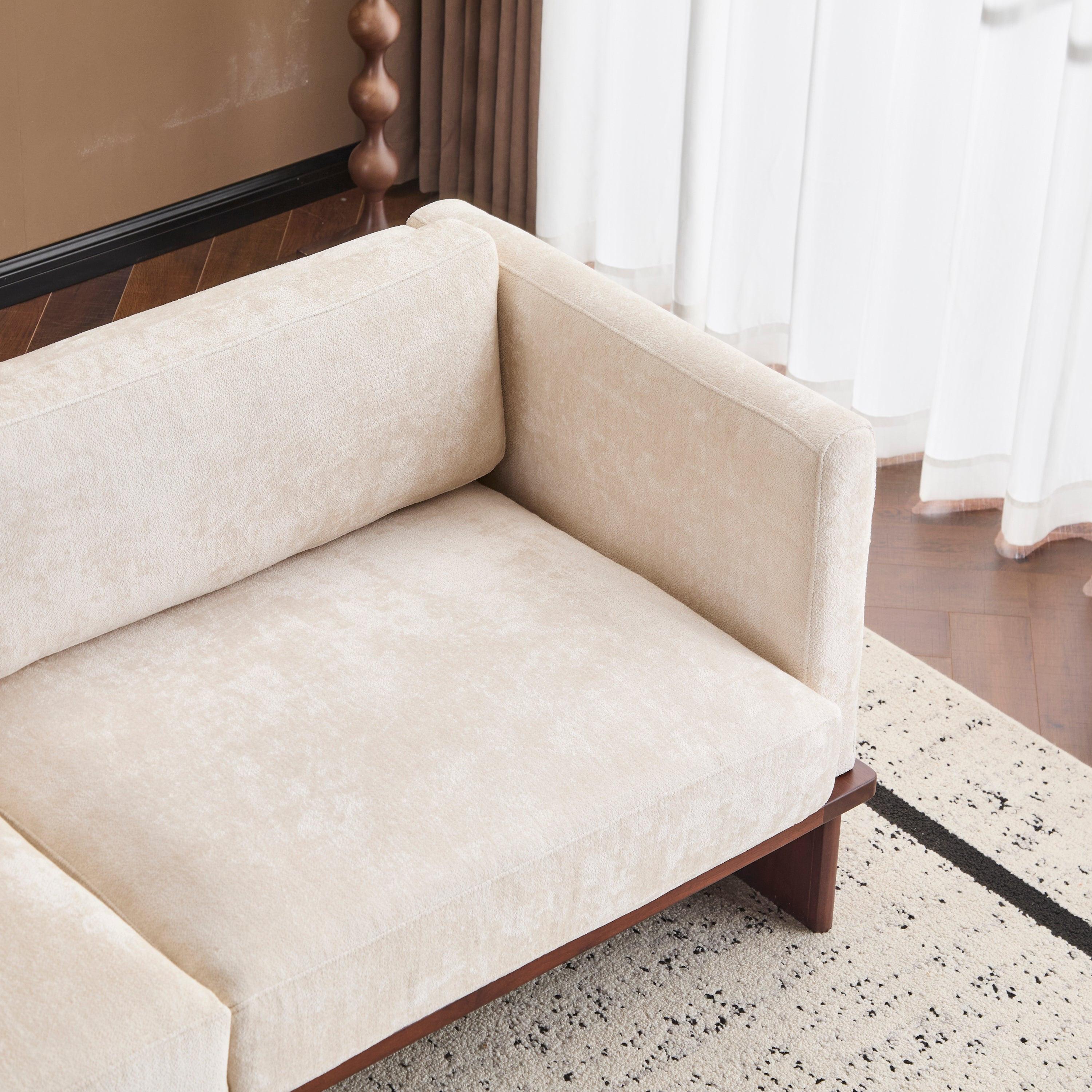 Modern Three-Seater Boucle Sofa - Beige Upholstered Couch.