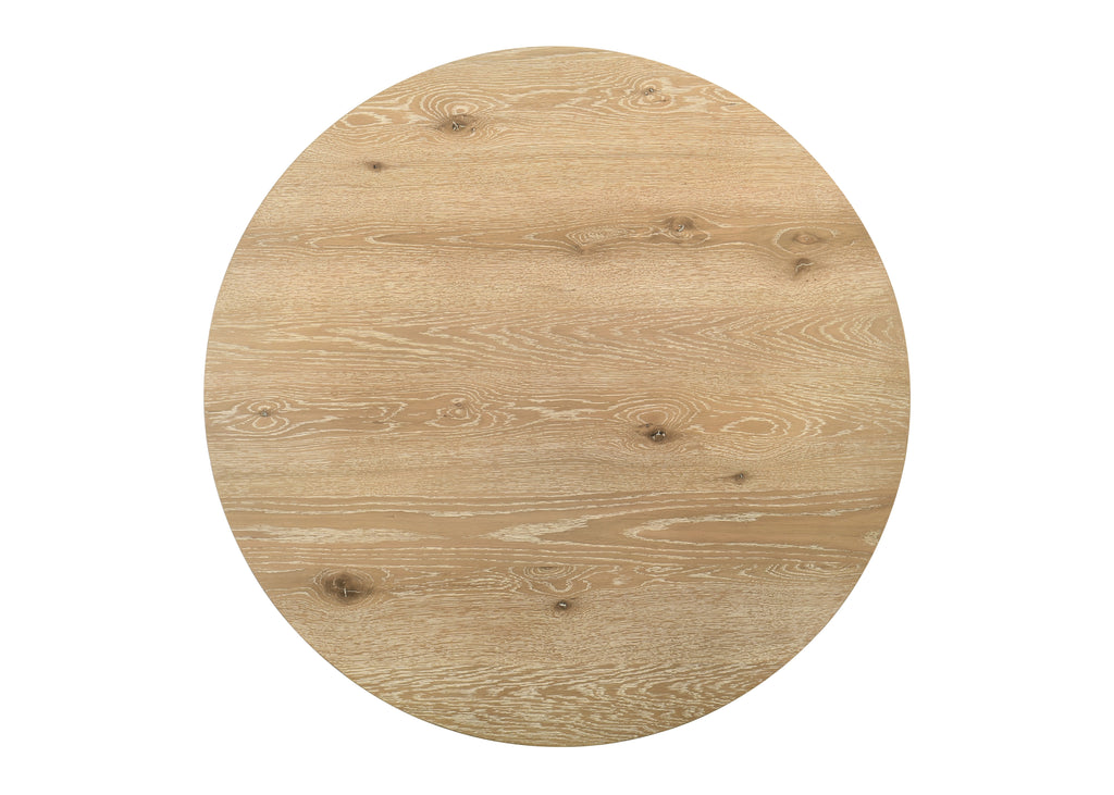 Top-down view of the Round Oak Dining Table highlighting the smooth oak finish and circular shape.