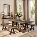 Rustic 72-inch dining bench crafted from reclaimed medium dark brown elm wood, featuring a sturdy trestle base.