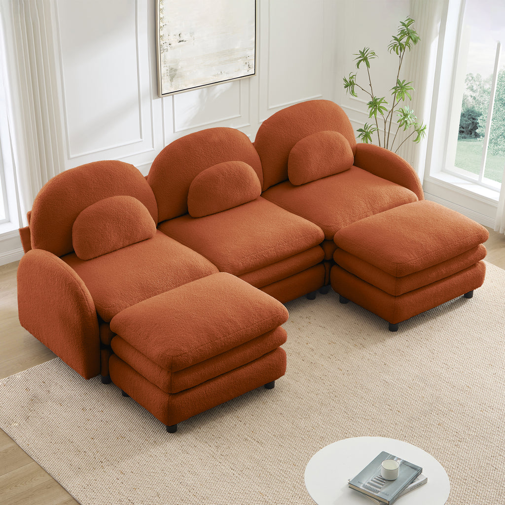 Orange teddy fabric 3-seater sectional sofa with a curved back, lumbar pillows, and two movable ottomans.