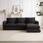 L-shaped modular sofa sleeper with ottoman and 3 pillows, styled in a cozy living room with neutral decor and fireplace.