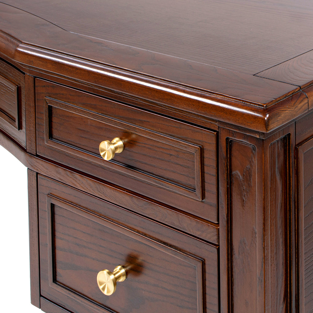 Close-up of Executive Desk 5-Drawer Wood - Gold Accents drawer corner with gold knob and detailed wood craftsmanship.