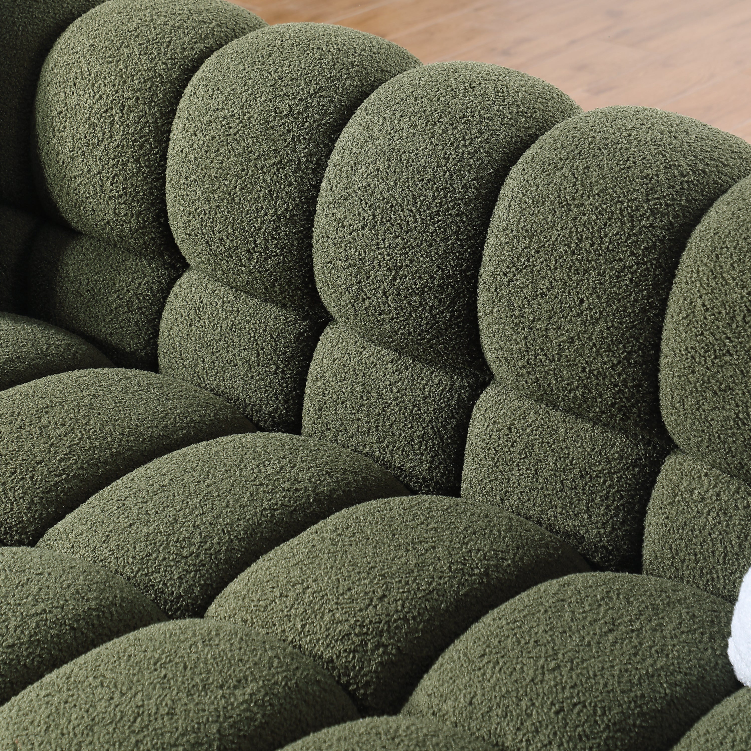 Backrest detail of Olive Green Boucle Sofa - 3 Seater, Marshmallow Cozy with plush, rounded cushions and boucle fabric.