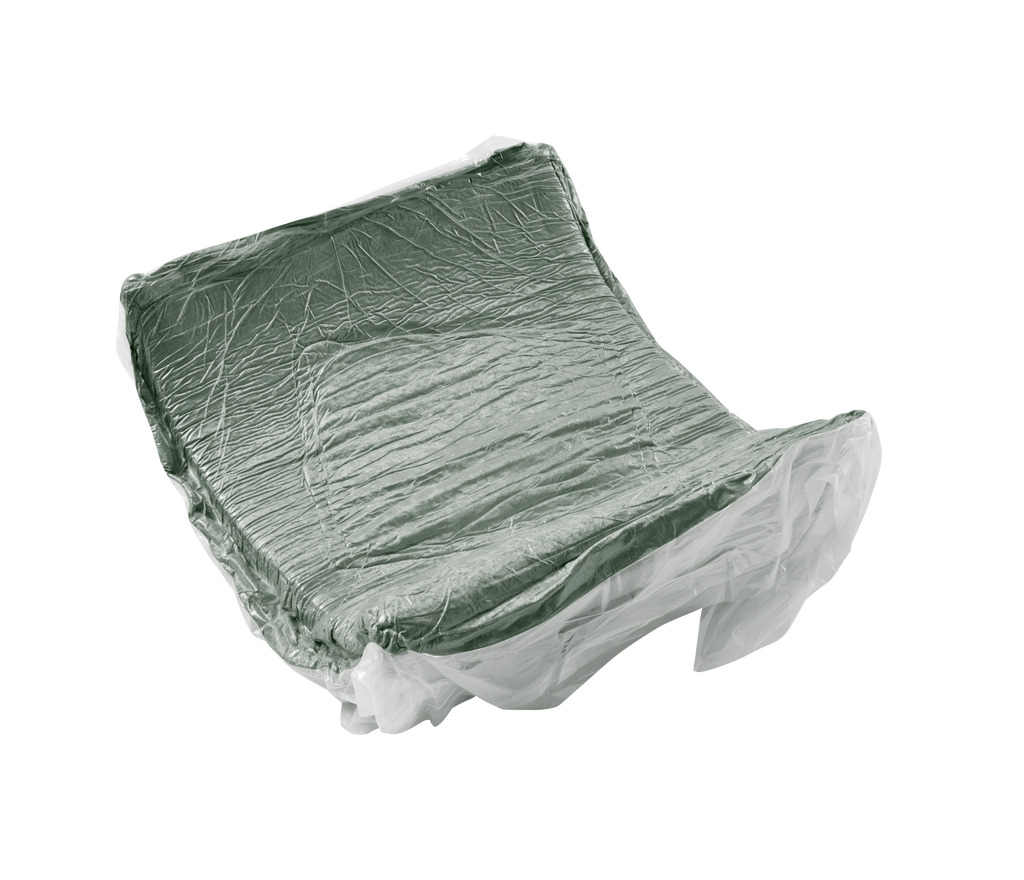 Vacuum-sealed cushion of the Modular Green Sofa 4 Seat Velvet couch wrapped in protective plastic for safe delivery and easy setup.