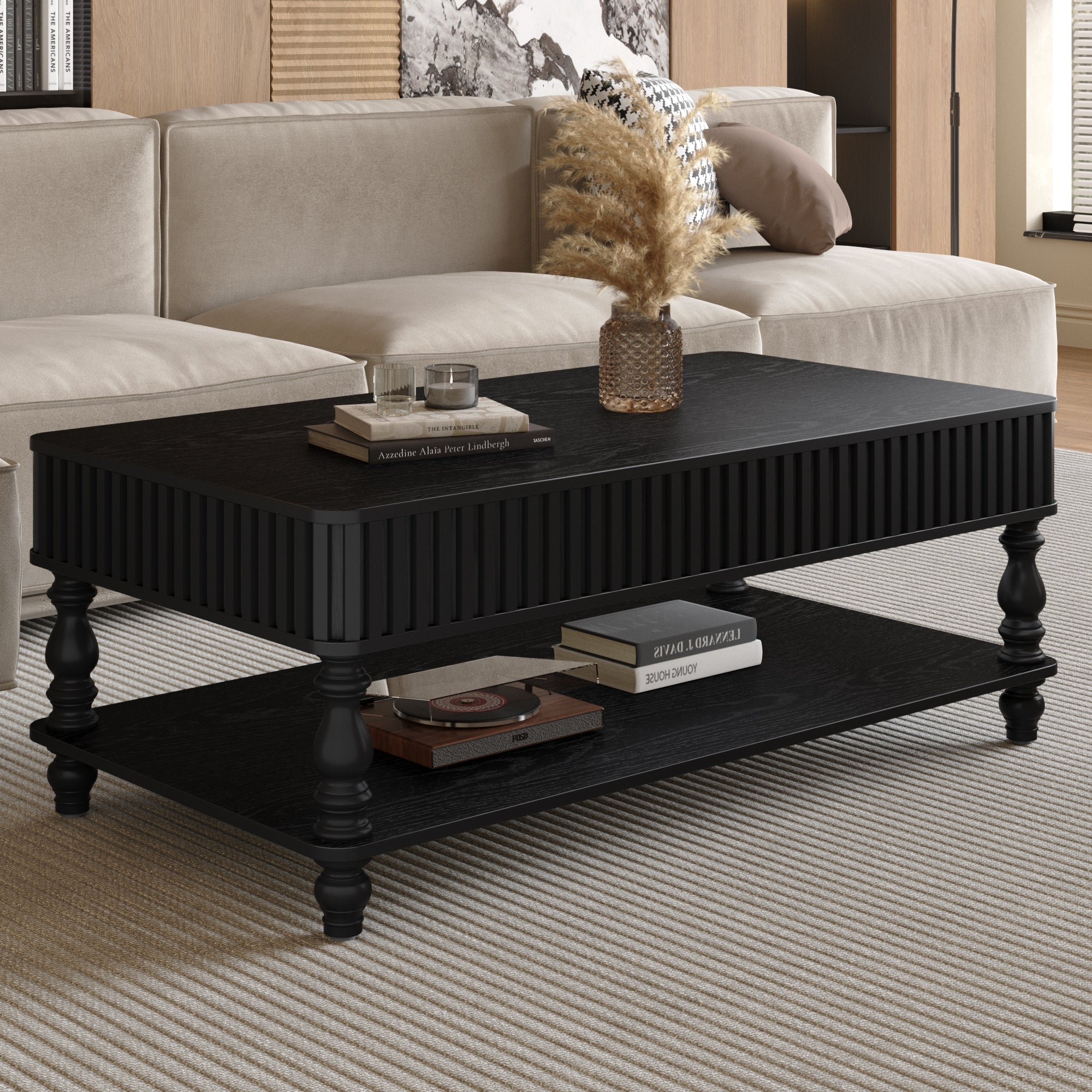 Black modern coffee table with lift top and Roman column legs, featuring a lower shelf for books and decor in a contemporary setting.