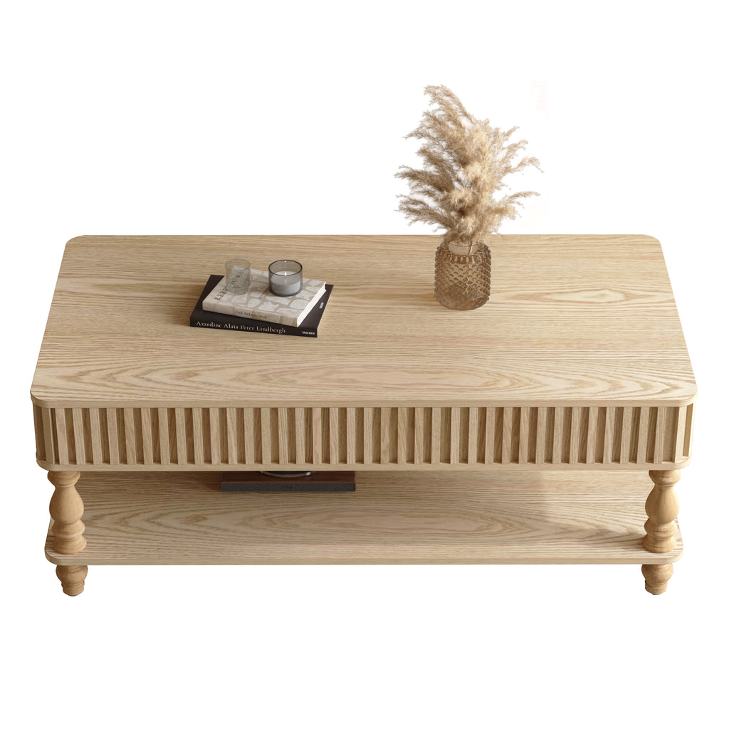 Lift top coffee table with hidden storage in solid wood, featuring fluted sides and turned legs for an elegant, space-saving living room solution.