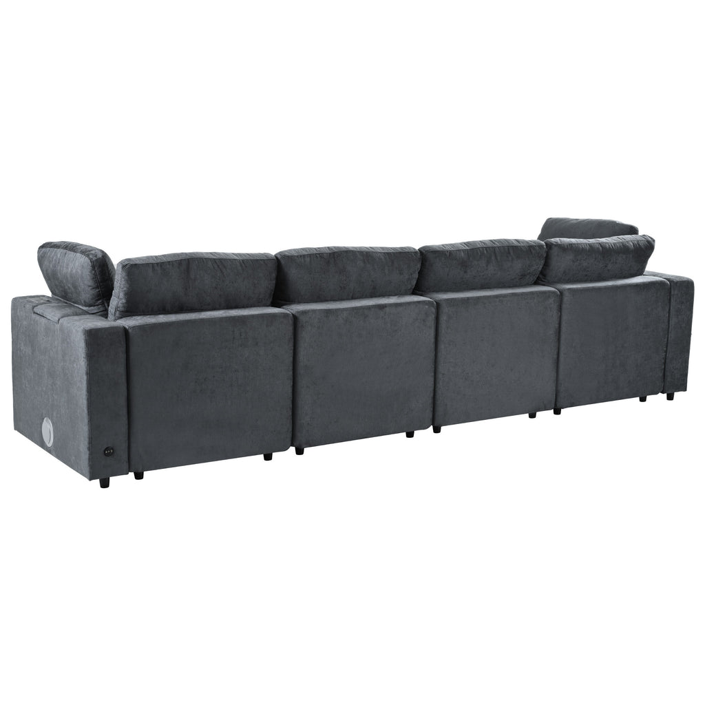 Rear view of modular sofa with hidden storage and charging ports, showcasing modular sections and tech integration.